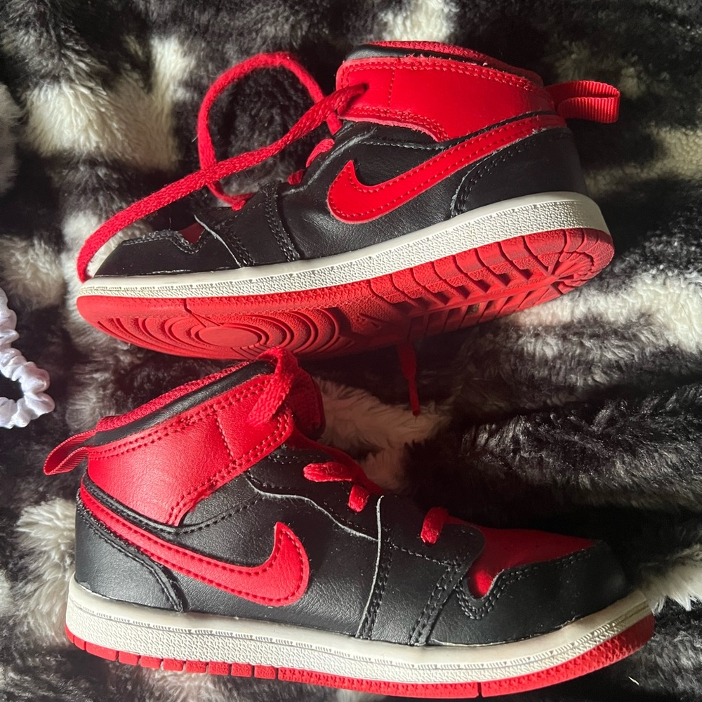 Nike Black and Red Sneakers with Classic Design